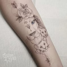 a woman's arm with an animal and rose tattoo on the left inner forearm