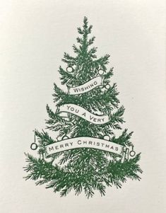 a christmas card with a tree and ribbon on the front, which reads wishing you very merry christmas