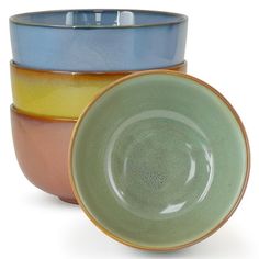 three bowls stacked on top of each other with one bowl in front of the other