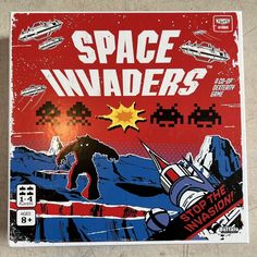 an old computer game with space invades on the cover