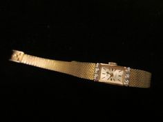 Art deco charming, Gruen Percision 17 Jewels, 10 K RGR Bezel Stainless Back, golden wrist watch,  Pat. Pen. 1/20 10 KT GF Kreisler U.S.A. noted on band, watch, in etching & engraving. Hand winding, and is working, Excellent presentation. A 6.5" around the wrist, 1" x half inch, with six small symmetric diamonds or white stones. Luxury Gold Self-winding Watches, Jean D Eve Watch, Luxury Evening Watches With Gold Clasp, Gold Cocktail Watches Women, Dainty Stretch Watch, Vintage Gold Cocktail Watch, Vintage Watches Antique Gold Sekonda, Golden Wrist Watch, Vintage Gold Watch