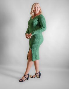 Unleash your holiday glam with our Green V-Neck Cable Knit Sweater Dress with a sassy slit! Elevate your style game at those festive gatherings with a dress designed just for you tall queens. Featuring a dreamy soft cable knit, this dress not only looks fabulous but feels like a cozy dream against your skin. The vibrant green color adds a touch of elegance, perfect for stealing the spotlight at holiday parties. But wait, there's more! Strut your stuff with confidence thanks to the thoughtfully a Tall Sweater, Cable Knit Sweater Dress, Holiday Glam, Knit Sweater Dress, Vibrant Green, Cable Knit Sweater, Holiday Parties, Cable Knit, The Struts