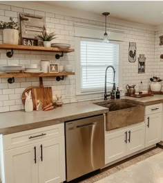 the kitchen is clean and ready for us to use in its new owner's home