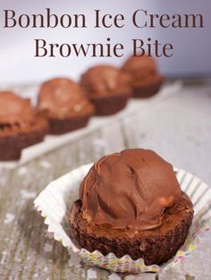 there is a cupcake with chocolate frosting on it and the words, bonbon ice cream brownie bite