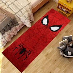 a bedroom with a spiderman rug on the floor