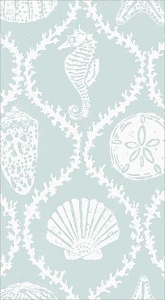 a blue and white wallpaper with shells on it