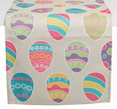 an image of a table runner with colorful eggs on it