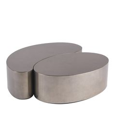 two circular metal tables sitting side by side on a white background, one is silver and the other is black