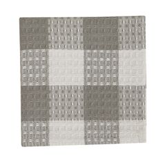 a gray and white checkered rug on a white background