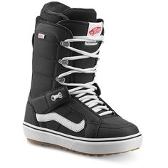 a black snowboard boot with white laces