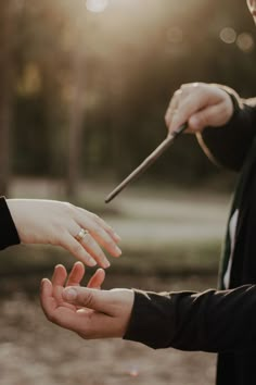 two people reaching out their hands to touch each other