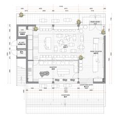 an architectural drawing shows the floor plan for a restaurant, with seating areas and tables