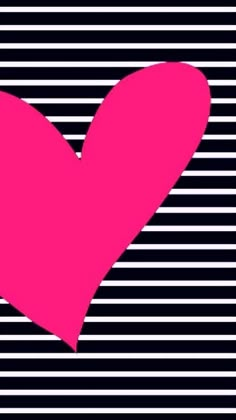 a pink heart on a black and white striped background