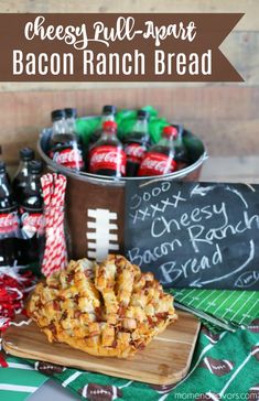 cheesey pull apart bacon ranch bread on a cutting board next to soda bottles and football napkins