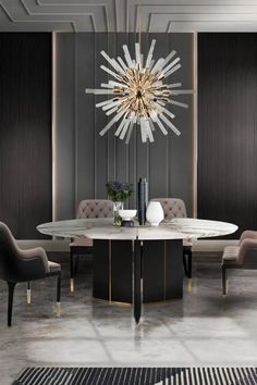 an elegant dining room with modern chairs and a chandelier