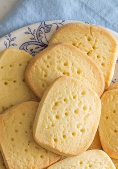 some cookies are on a blue and white plate