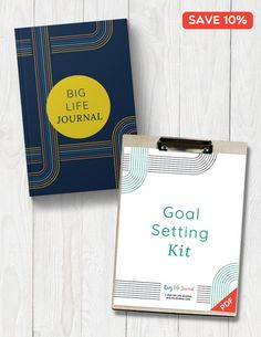 the goal setting kit is on display next to a clipboard with an advertise