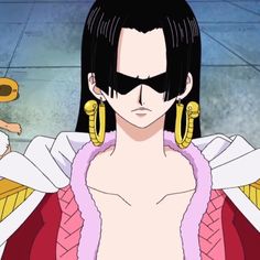 an anime character with large gold earrings and black hair, wearing a pink outfit in front of a wall