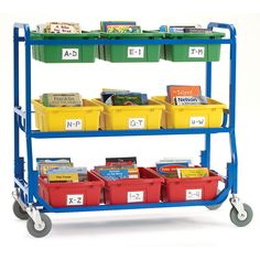 a blue cart filled with lots of books and bins on top of each other