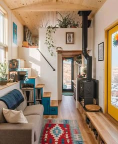 a living room filled with furniture and a fire place