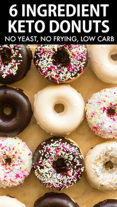 a box filled with lots of different flavored donuts covered in sprinkles