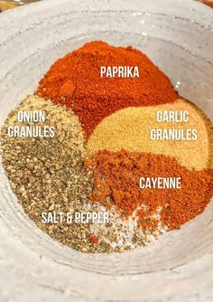 spices in a bowl labeled with their names