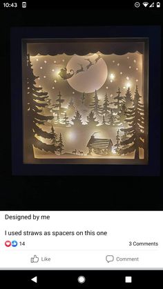 an image of a christmas scene made out of paper with lights on it and santa flying over the trees