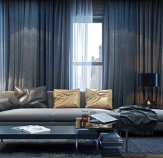 a living room filled with lots of furniture next to a window covered in drapes