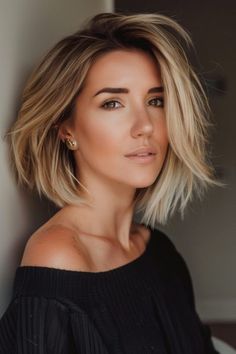 Woman with short, blonde hair wearing an off-the-shoulder black top looking at the camera. 90 Bob Haircut, 90s Bob Haircut, 90s Layered Bob, Brunette Lob, Copper Red Hair, Textured Bangs, Copper Blonde, Blond Balayage, Blonde Tones