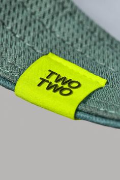 a yellow tag that says two two on it