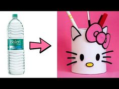 a plastic cup with a hello kitty face on it next to a bottle of water