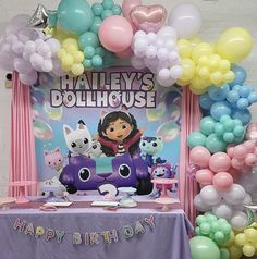 a birthday party with balloons and decorations