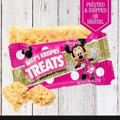 minnie mouse treats are displayed on a white wooden table with pink and gold glitters