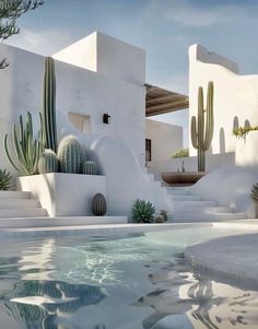 an outdoor pool with cactus and succulents next to it