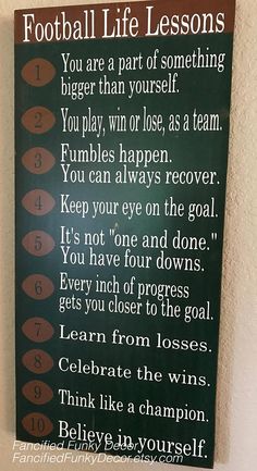 a football life lessons sign hanging on the wall