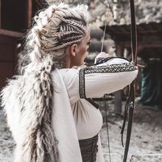 Viking braids, or Nordic braids, are a style of braid thought to be worn by ancient Vikings. The women of these cultures were hard workers, and some were even thought to be warriors. Braids kept long hair tight to the head in battle and made room for helmets.  Today, Viking braids are a beautiful and […] Nordic Braids, Hairstyles For Long Hair Tutorials, Long Hair Tutorials, Warrior Braid, Dutch Braid Styles, Summer Hairstyles For Long Hair, Side French Braids, Viking Braids, Large Curls