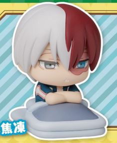 an anime character with red hair and blue eyes sitting on top of a pillow in front of a sign