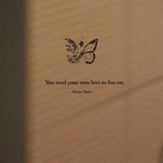 a piece of paper with an image of a butterfly and the words you need your own love to live on