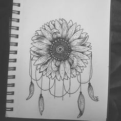 a drawing of a sunflower with feathers on it