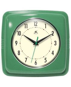 a green square clock with black hands and numbers