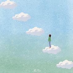 a man standing on top of a cloud filled sky