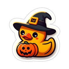 a rubber duck wearing a witches hat and holding a pumpkin