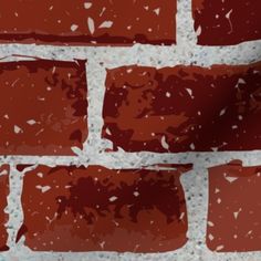 a brick wall with red and white paint splattered on it's surface