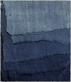 several pieces of blue fabric with frays on them, including one in the middle