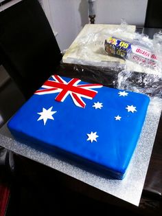 there is a cake that looks like the flag of australia on top of a table