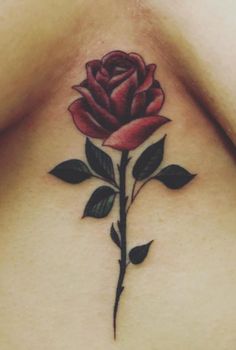 a rose tattoo is shown on the chest