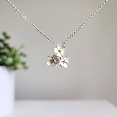 Inspired by the beauty of our nature incorporating flowers. Our cluster Forget-me-not flowers are crafted with 100% highest quality 925 sterling silver and 18K gold vermeil silver. The matching flower necklaces are made with the solid 925 sterling silver as well. Size: Earrings (W x L): approx. 13mm x 59mm Pendent (W x L): approx. 13mm x 13mm The chain is about 40cm long with 3" extender 🍒 Lead and nickel free 🎁 Gift wrap 💖 Top-quality 🌺 Fine Polishing Long Dangle Earrings, Forget Me Not, Silver Art, Wrap Top, Free Gift Wrapping, Flower Necklace, Hook Earrings, Long Earrings, Solid 925 Sterling Silver