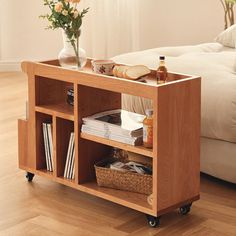 a living room scene with focus on the coffee table and storage unit in the foreground