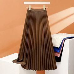 45327263924441|45327263989977|45327264022745|45327264088281 Fall Stretch A-line Pleated Skirt, Fitted Brown Pleated Skirt, Fitted Full Pleated Brown Skirt, Fitted Full Brown Pleated Skirt, Brown Long Pleated Skirt For Winter, Brown Flowy Pleated Skirt For Spring, Casual Brown A-line Skirt, Spring Brown Flowy Pleated Skirt, Spring Brown A-line Pleated Skirt