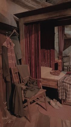 an old fashioned bedroom with two beds and a rocking chair